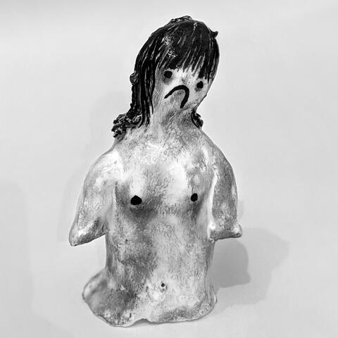 Painted clay figure